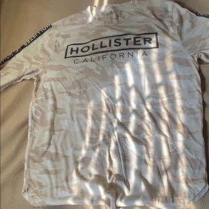 A light creme camouflage long sleeve shirt